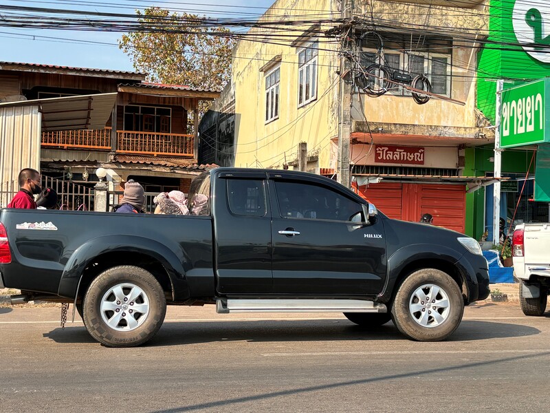 endless numbers of small trucks that carry passengers in the loading area