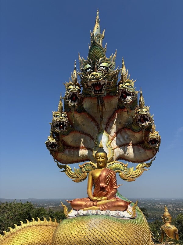 sculpture of a giant naga in Thailand that appears to move across the terrain for many meters. (Wat Tham Pha Daen, Sakon Nakhon)